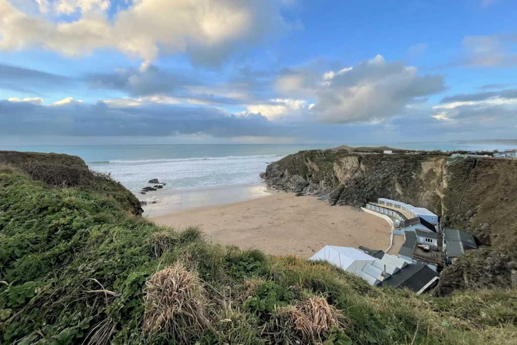 View over Mawgan Porth beach in Cornwall from the coastal path.