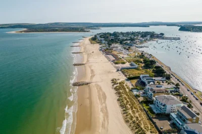 Row of UK cottages by the sea in Sandbanks, Dorset.
