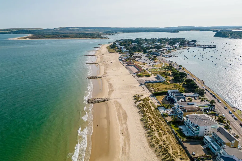 Row of UK cottages by the sea in Sandbanks, Dorset.