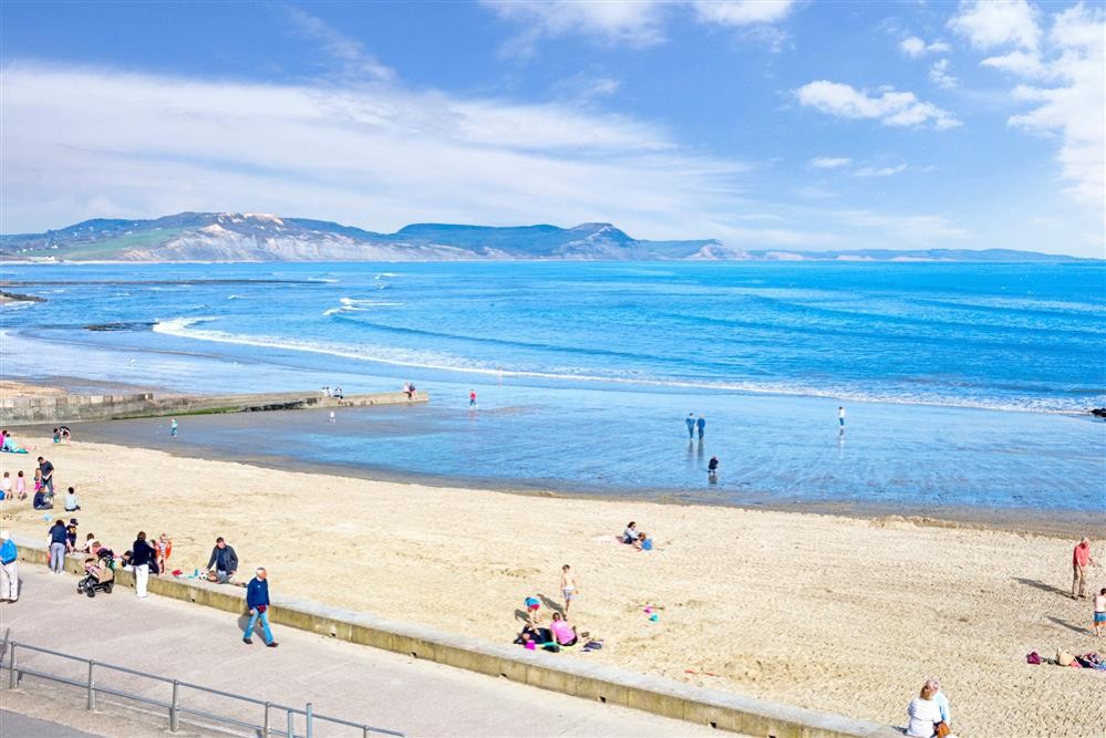Lyme Regis beach with families during Easter weekend