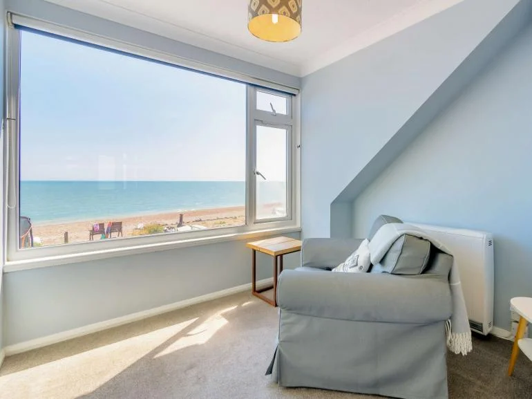 Beach and sea view from large pet friendly house in Pevensey Bay, Sussex