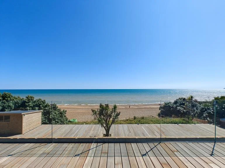 Deck are with sea views and direct beach access