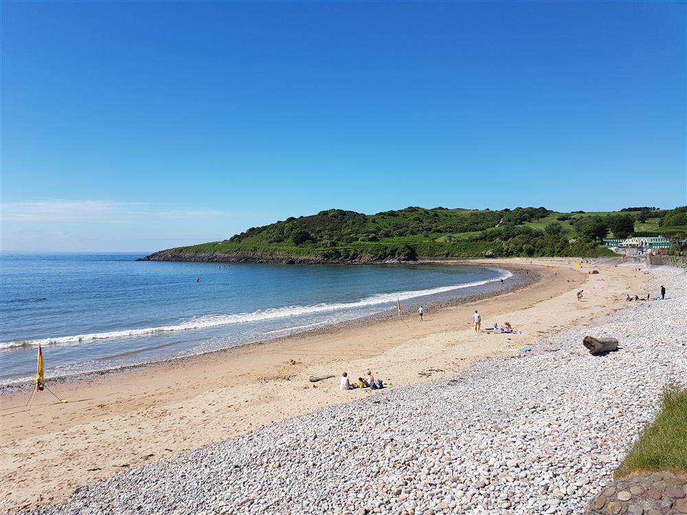 Almost empty beach at Swansea in South Wales during Easter weekend