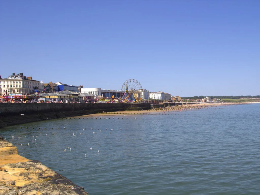 Bridlington South Beach showing promenade and wooden groynes