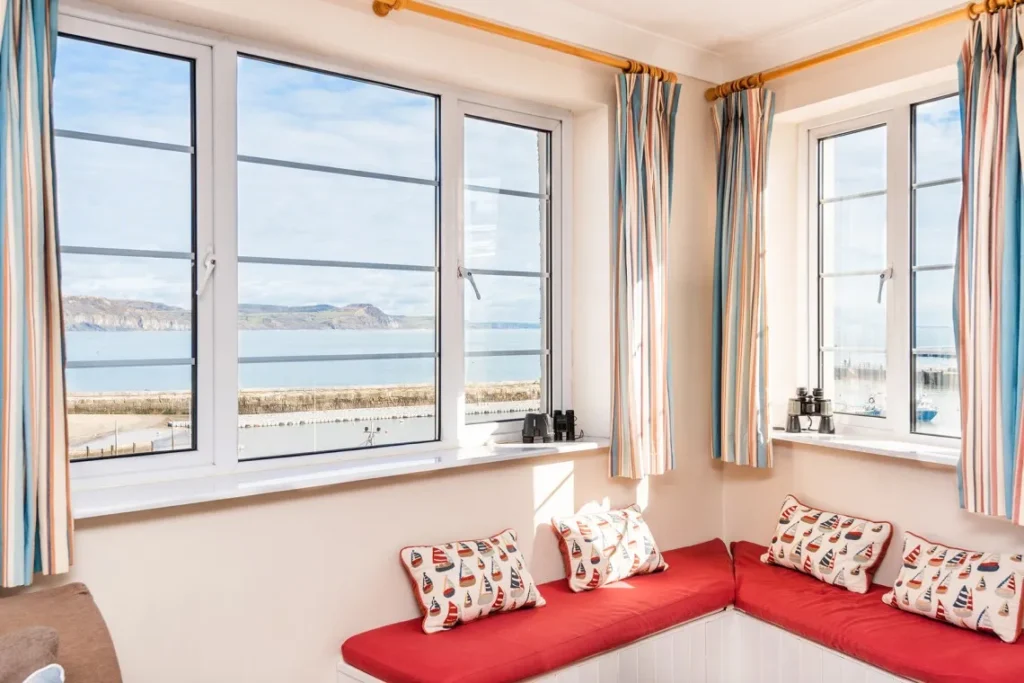 Apartment living area with beach and sea views in Lyme Regis, Dorset