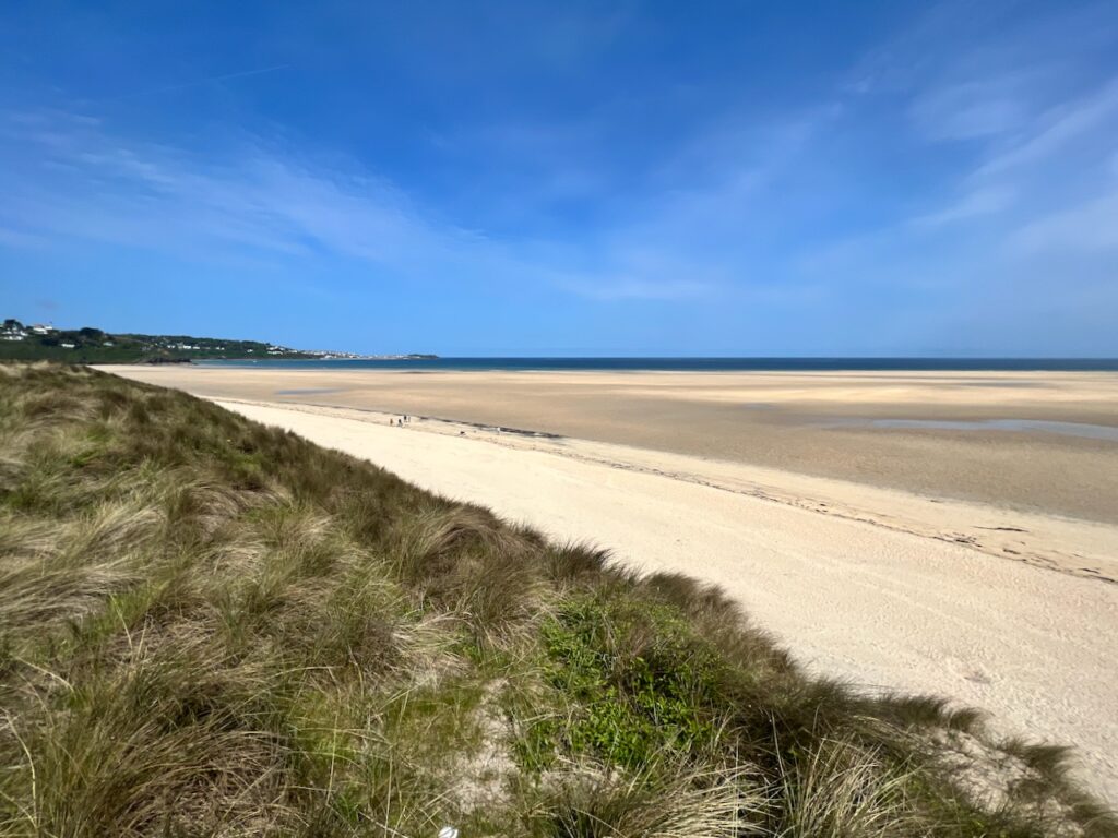 The long sandy beach of Porthkidney in St Ives, Cornwall
