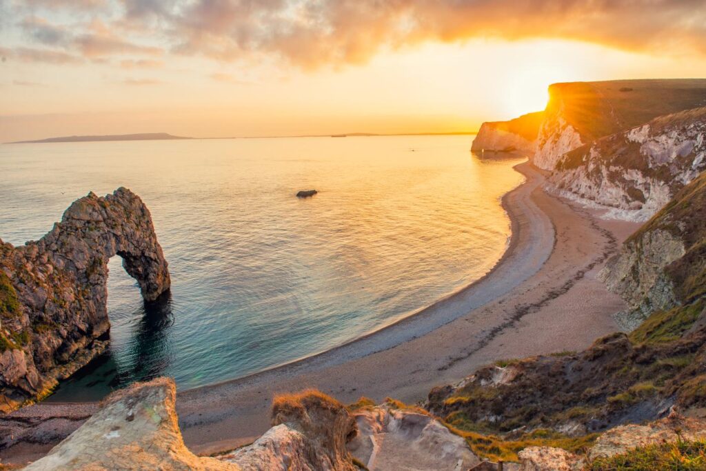 A magnificent sunset overlooking Durdle Door Beach on the Jurassic Coast
