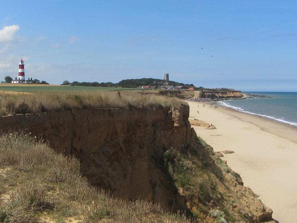 Lighthouse in the distance near Happisburgh Beach