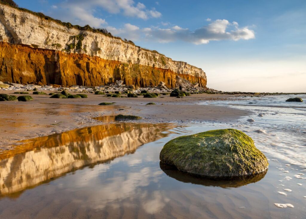 Towering cliffs at the back of Old Hunstanton Beach in Norfolk