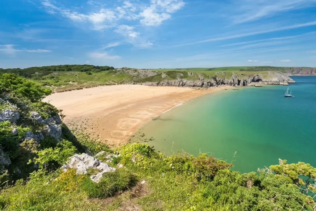 Overlooking Barafundle Bay with a lone sailing boat moored offshore